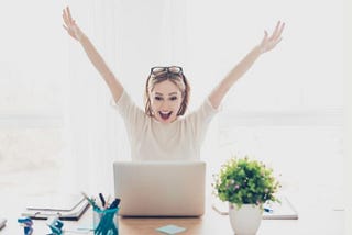 Woman happy while building her brand online