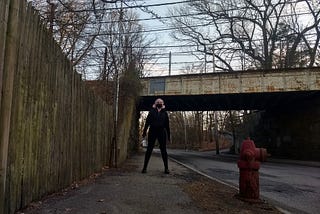 Author standing beneath Boston MBTA subway overpass. Photo: E. Stephen Frederick