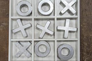 Reverse Tic-Tac-Toe