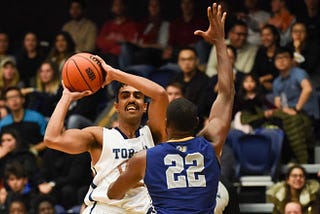 Rams use Big 2nd Half to Topple Varsity Blues 88–61