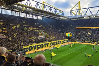 Dortmund fans with a ‘Boycott Qatar 2022’ sign.