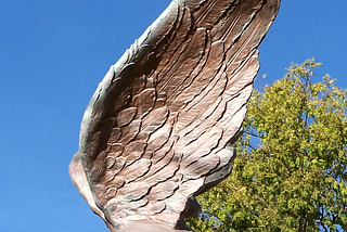 Eagle wings in front of the Navy Station Puget Sound