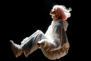 Ggirls levitating behind the black screen