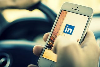 Mobile screen with LinkedIn logo in it.