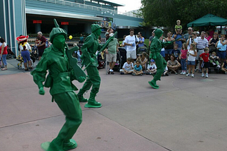Green army men in a parade at Disney world
