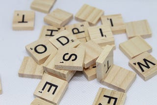 a pile of Scrabble tiles