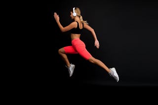 run-hard-get-into-shape-woman-run-black-background-jogger-jump-with-long-run-fit-athlete-fashion-sportswear-athletic-female-sprinter-runner-active-dynamic-run-fast-finish-soon — Un Swede