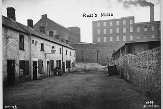 Black and white photo of a Belfast linen mill at the turn of the 19th century.
