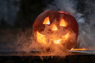 Smoky Halloween jack-o-lantern with smiley face