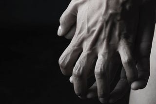 two hands touching