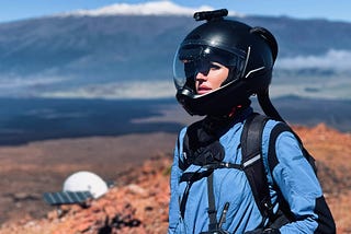 Hillary Coe dressed in a space suit for an analog Mars mission