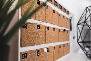 A blank calendar made of corkboard, shown at an angle.
