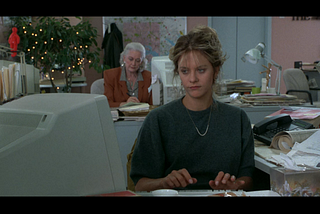 ©TriStar Pictures 1993 — Annie played by Meg Ryan typing in a computer