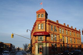 Red brick building known as the Crown Inn in Owen Sound