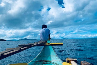 loneliness, sadness image, boy on a boat into the sea, sad poem