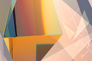 Image of an orange prism reflecting light onto a lightly pink surface.