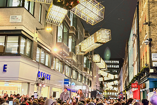 People gather for the lighting of the Carnaby Street Christmas illuminations, 2024.