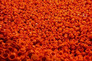 Orange LEGO bricks from a LEGO pick-a-brick wall.