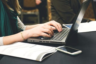 Someone is using the laptop. Photo from pexels.com.