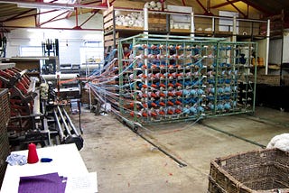 A large loom at a woollen mill.