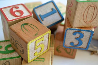 Stacked children’s numbered blocks