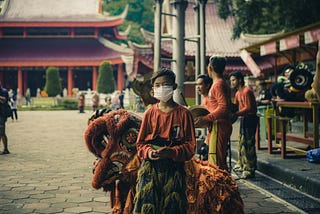 Kids performing dance and rituals at tourist spots.
