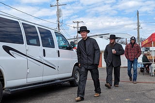 Amish man walking.