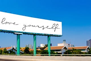 Love Yourself: A Freeway Sign’s Message of Self-Acceptance