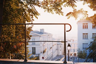 Path above city at sunrise