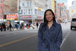 Yuh-Line Niou stands on the side of a street in Manhattan, New York