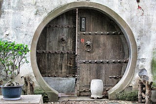 Unusual circular door with the appearance of a treasure vault.