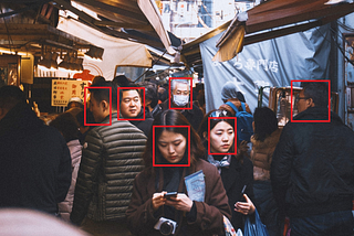 Multiple faces detected from people in the street.