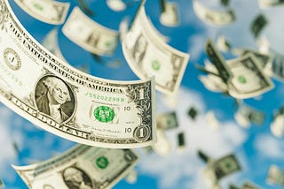 1 dollar notes falling from the sky