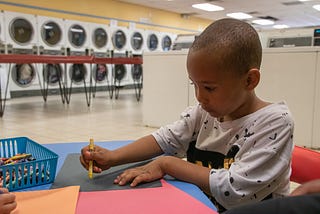 Wash and Learn program brings the library to Detroit laundromats