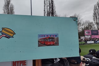 A sticker stuck to one of the food concessions at Champion Hill: “I live the dream” with a picture of a bus operating on route P13.