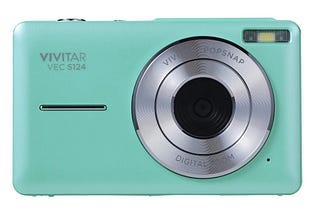 A promotional shot, on a white background, of a teal-colored Vivitar VECS124 PopSnap camera.