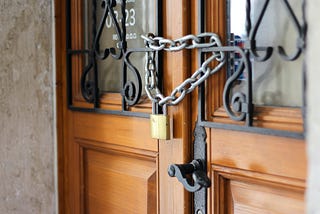 A chained front door.