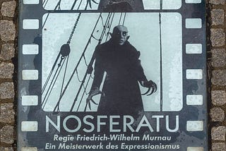 Commemorative plaque for the silent motion picture classic Nosferatu (1922) at the market square of Wismar, Landkreis Nordwestmecklenburg, Mecklenburg-Vorpommern, Germany. Parts of the film were shot in Wismar.