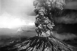An ash plume billows from the crater atop Mount St. Helens hours after its eruption began on May 18th, 1980