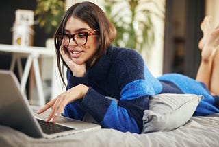 A part-time writer working on her laptop.