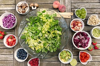 Table with various superfoods in many different bowls