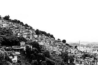 A black and white photo of a favela in Rio de Janeiro. Photo from Nayani Teixeira on unsplash.com
