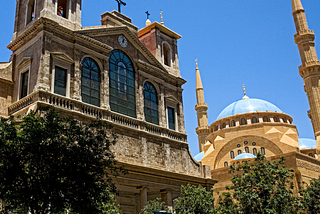 A Maronite Christian church across the street from a Muslim mosque in downtown Beirut.