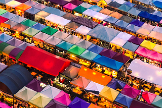 Photograph of a marketplace, courtesy Lishen Chang on Unsplash