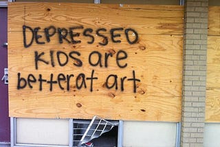 Graffiti that reads “Depressed kids are better at art”; a photo that circulated social media in the mid 2010s.