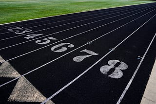 Track lanes next to a field.