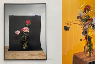 Two framed photographs of flower arrangements.