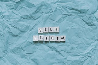 When does self-esteem begin to develop?