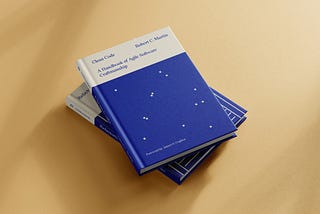 Mockup of two books, one on top of the other. On the top is ‘Clean Code’ by Robert C. Martin. It showcases the cover, redesigned by María Simó, on cream and electric blue tones and some dots resembling pixels or constellations.