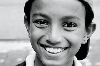 A teenage boy, smiling